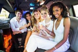 Group of people riding a limo